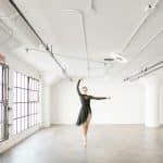 A woman dancing in the room